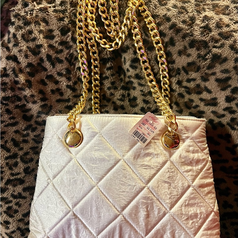 Elegant White Quilted Bag with Gold Chain